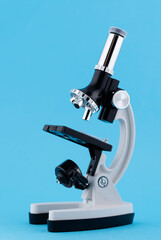 Laboratory Microscope on blue background