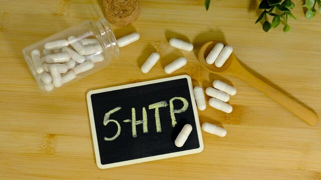 5-HTP sleep supplement capsules. Selective Focus.