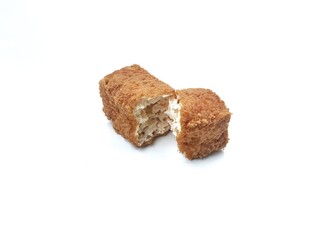 Tahu or Asian food made from the sediment of coagulated soybeans. Isolated on white background