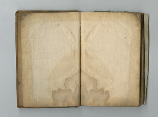 Old book, parchment and blank paper in vintage texture or faded water damage on page. Ancient,...