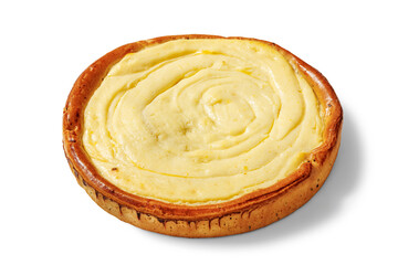 Whole Cheesecake isolated on white, top view