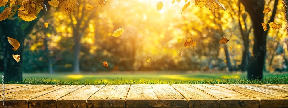Poster a yellow wooden table with a blurred background of trees and sunlight, creating an outdoor scene. th