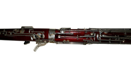 Beautifully crafted bassoon features a rich wood finish and silver keys, demonstrating the artistry of classical wind instruments in a clear isolation against a white backdrop.