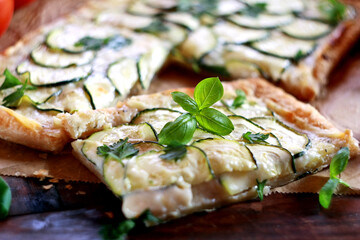 Zucchini puff pastry tart with mozzarella and cream cheese