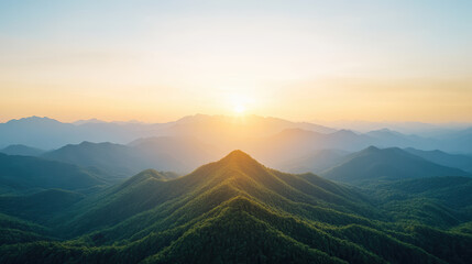 Obraz premium Breathtaking mountain silhouettes rise against vibrant sunrise, creating serene atmosphere