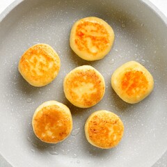 Cottage cheese pancakes (syrniki or curd fritters), top view