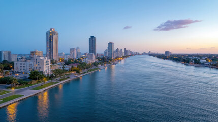 Fototapeta premium stunning skyline view featuring modern buildings along serene river dusk, showcasing vibrant