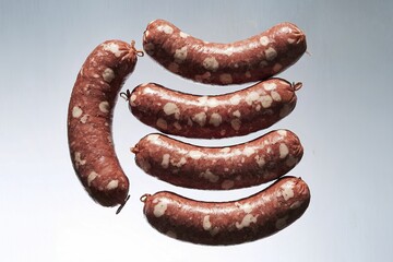 A photo of raw sausages