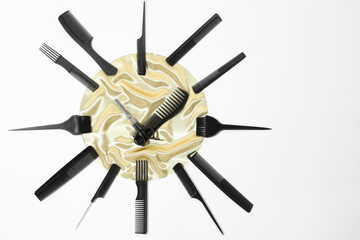 Clock made with hairdresser's tools on white background, flat lay