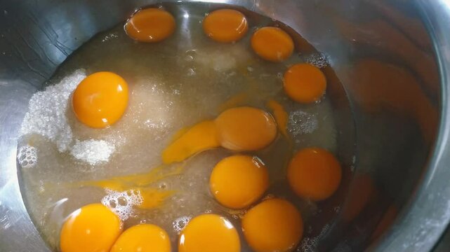 Cake dough. Duck egg and sugar dough. making cake dough.