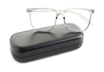 Stylish glasses and case isolated on white