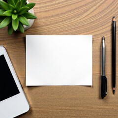 White paper with black inked business card layout and corporate elements on a wooden background, white, design