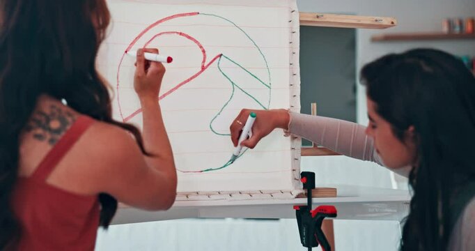 Women, drawing or pattern in art class with creativity, bonding together or color circle shape on paper for craft. Friends, artist or collaboration designer inspiration or sketch project in workshop