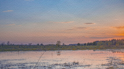 Calm lake with a beautiful sunset in the background