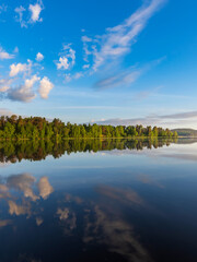 Fototapeta premium Beautiful lake with a blue sky in the background