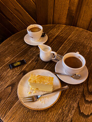 Coffee and cake on a wooden table