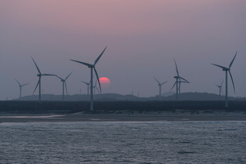 wind turbine at sunset