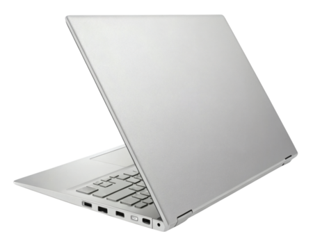 A modern laptop isolated on a white background withvarious technology and business-related elements like a notebook, keyboard, and portable equipment