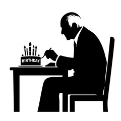 Fototapeta premium Elderly man writing near birthday cake silhouette