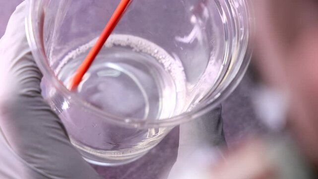 Painter Mixing Hardener for Paint
