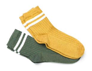 Pairs of stylish socks isolated on white, top view