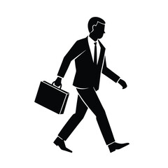Silhouette of a businessman walking with briefcase.