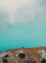 Aerial view of Misty Volcano of Kawah Ijen crater in East Java