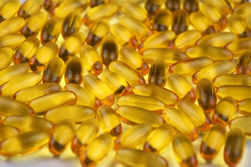 Fish oil Omega 3 capsules with EPA and DHA, vitamin D3, vitamin E, vitamin.