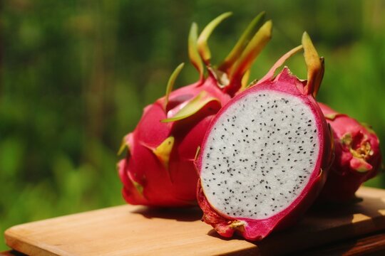 dragon fruit on wooden table