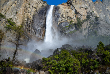 Beautiful double rainbow in front of Bridalveil Falls located in Yosemetie National Park in California