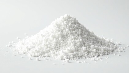 Pile of white granulated sugar on white background, isolated, pure