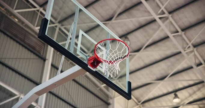 Basketball, games and shot in net, hoop and competition in campus court, pole and sports in university. Match, empty and achievement in college gymnasium, dunk and miss in school stadium or victory