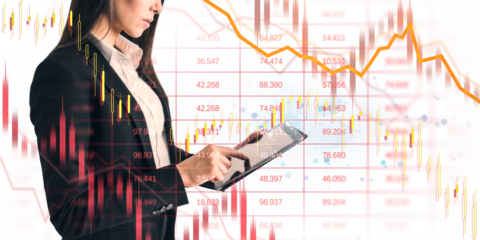 Businessperson using tablet with financial chart overlay, clean layout on light background, concept of stock market crash and global crisis