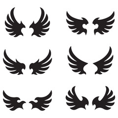 Vector Black silhouettes Dragon Crest Wings. with white background
