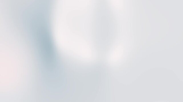 Blurry light gray gradient background ideal for web design, social media, presentations, and backgrounds in digital projects hoping to create a modern aesthetic.

