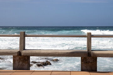Fototapeta premium Benches on the Atlantic ocean coast, Spain