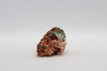 Raw copper (cu - Cuprum) isolated on a white background. Raw copper ore from California 