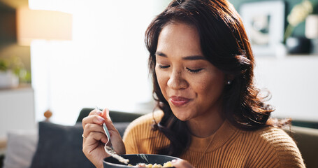 Smile, woman and eating food on sofa for healthy cuisine, nutrition or flavor enjoyment with relax....