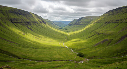 Fototapeta premium Lush Green Valley Landscape