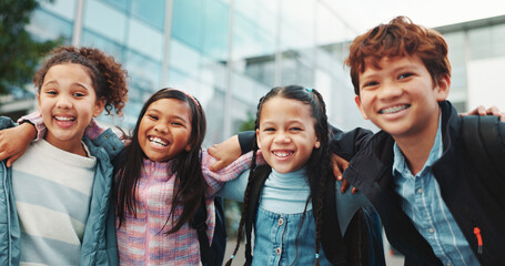 School kids, hug and group in portrait, smile and outdoor in city for solidarity, connection or together. Children, friends and excited for embrace, education and learning with scholarship at academy