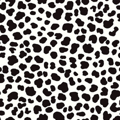Irregular Black Spots on White Background Creating Wild Theme