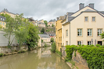 Fototapeta premium River Alzette along historical houses in the city of Luxembourg 