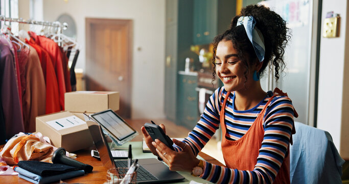 Woman, phone and happy for small business, ecommerce and fashion boutique startup with online sales. Designer, technology and digital website for internet store, retail service and quality control