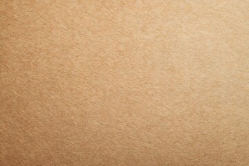 Light brown cardboard background with a rough texture.