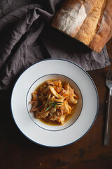 Stewed squid with onions and carrots