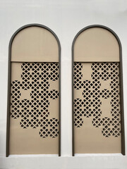 Arched building window with pattern inside
