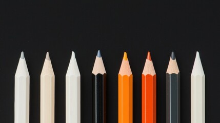 A row of colored pencils on a black background.