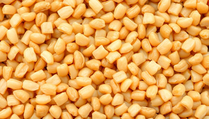 Close Up View Of Small, Light Beige, Cubed Food Pieces