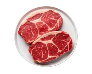 Fototapeta premium Raw Beef Steaks on Plate Ready for Cooking and Delicious Meals