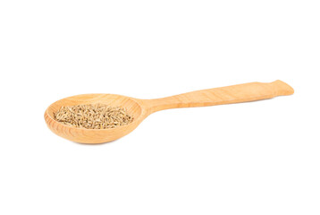 Cumin spice in a wooden spoon